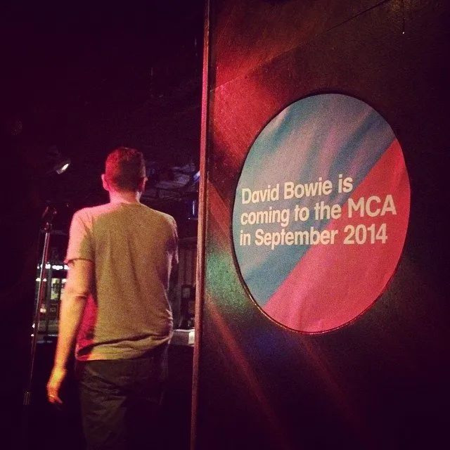 Sign at Bowie Ball 2014 reading David Bowie is coming to the MCA in September 2014